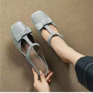 T-strap mules feature a decorative bow on the toe DSOZ & FASHION